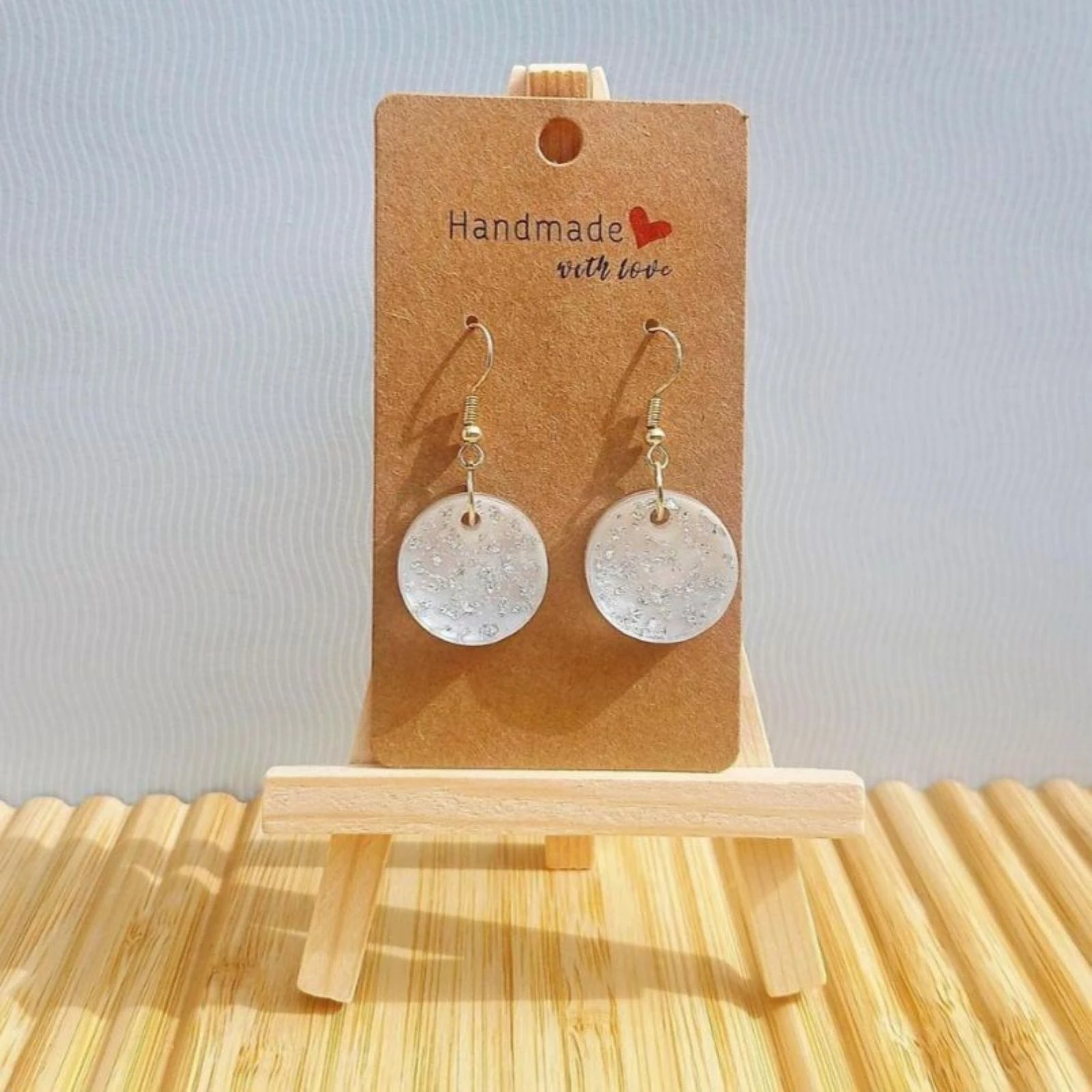 Boucles d'oreilles blanches feuilles d'argent 